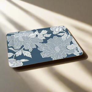 A classic rectangular tray with delicate white floral linework on a rich navy background.