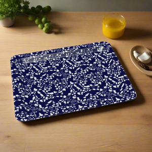Rectangular decorative tray (10.5” x 8”) with an energetic, abstract blue and white pattern made of curving, fluid brushstroke-like shapes.