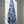 Microfiber and cotton terry towel featuring a bold blue and white ‘Trellis’ floral pattern.