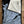 Microfiber and cotton terry towel with a black and light blue peony floral pattern.