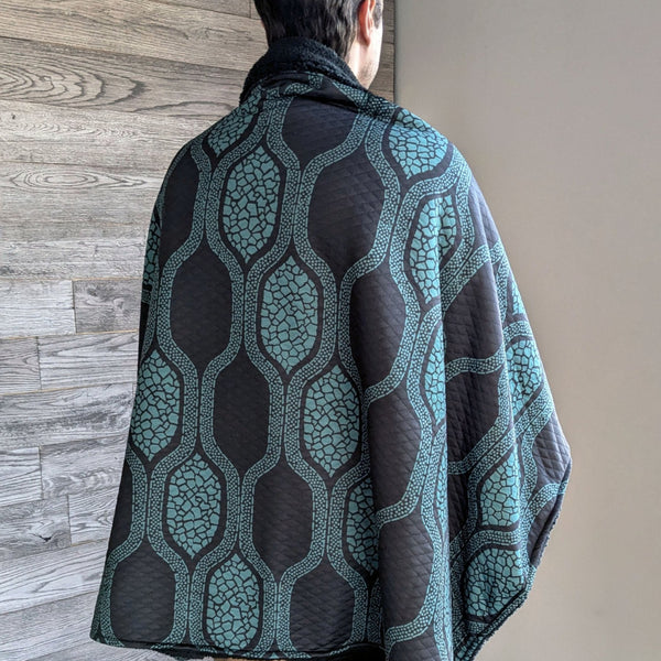 Rhythm Teal/Black Quilted Throw Blanket