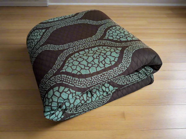 Rhythm Teal/Black Quilted Throw Blanket