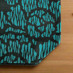 Teal Everyday Tote Bag with a vibrant peony floral pattern in shades of teal. Made from organic cotton canvas.