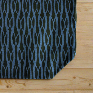 Black and blue Everyday Tote Bag with a wavy hourglass-inspired pattern, creating a sleek, modern design. Made from organic cotton canvas.