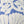 Soft velvet throw pillow featuring a blue and white floral stencil pattern inspired by traditional Japanese motifs.